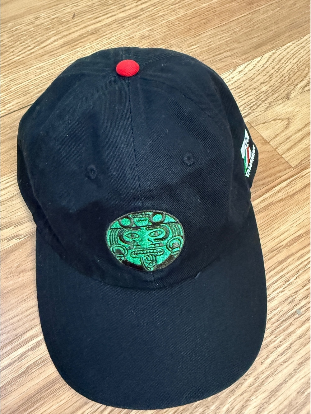 Talisman Black Baseball Cap with Green Embroidered Design